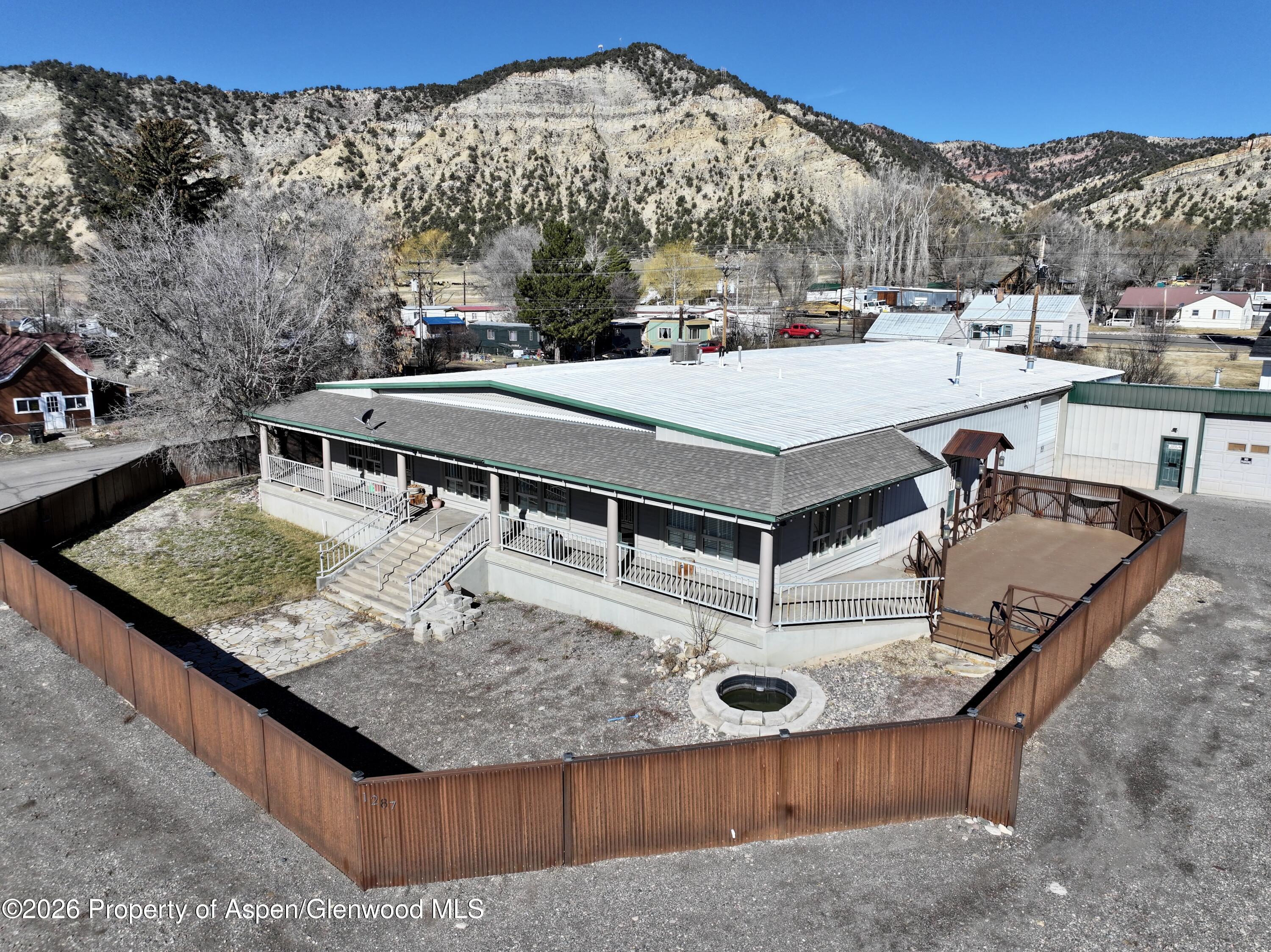 1287 Market Street Meeker, CO 81641 - Photo 1 of 42 a view of a backyard with sitting area
