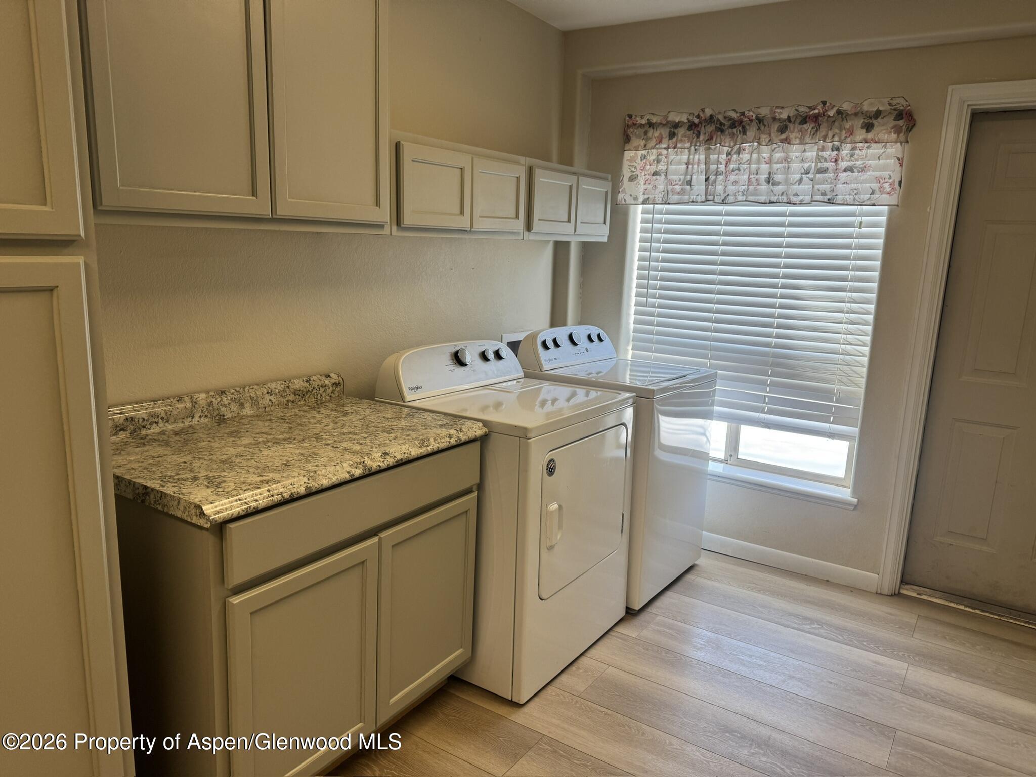 1287 Market Street Meeker, CO 81641 - Photo 12 of 42 a utility room with washer and dryer