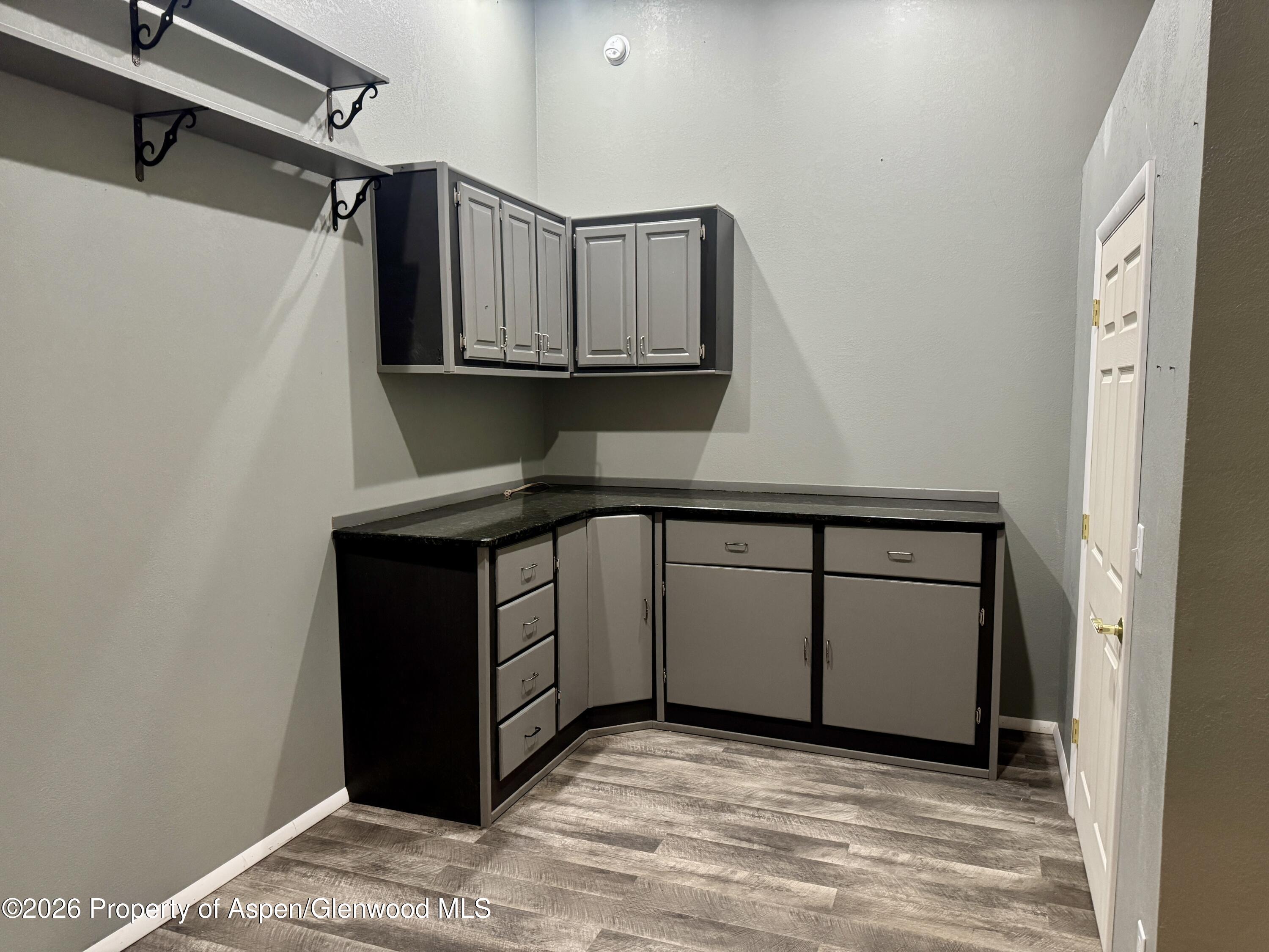 1287 Market Street Meeker, CO 81641 - Photo 26 of 42 a view of a utility room with cabinets