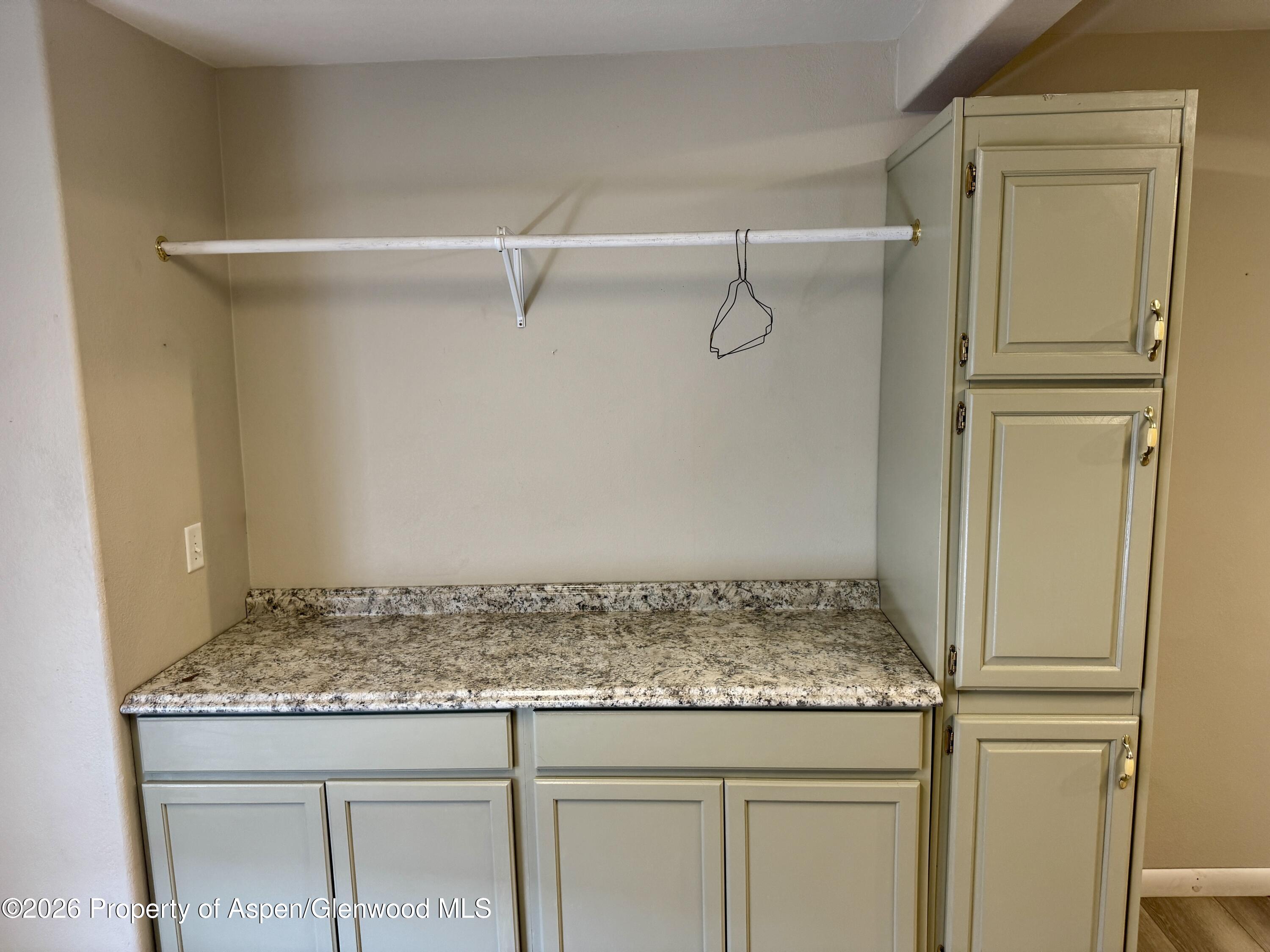 1287 Market Street Meeker, CO 81641 - Photo 27 of 44 a bathroom with a granite countertop sink and vanity