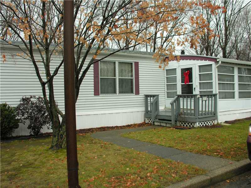 31 Woodward Road Lincoln, RI 02865 - Photo 1 of 8 Exterior Front. Lovely wooded lot, and an enclosed porch adds living space.