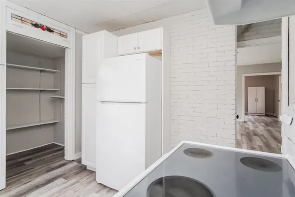 a bathroom with a tub and a sink
