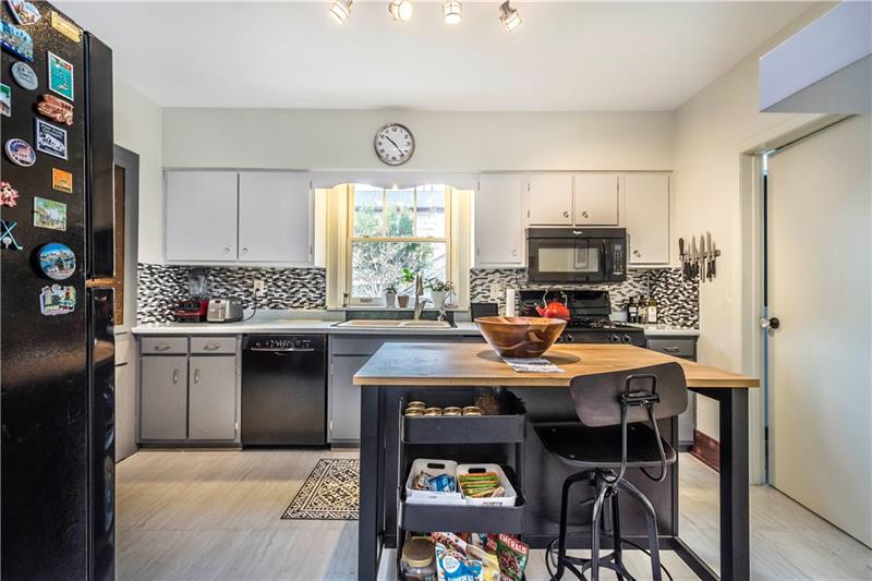 127 Friday Road Pittsburgh, PA 15209 - Photo 2 of 20 Updated kitchen with a modern feel. Complete with all of the appliances. A large pantry and bath are just off of the kitchen.