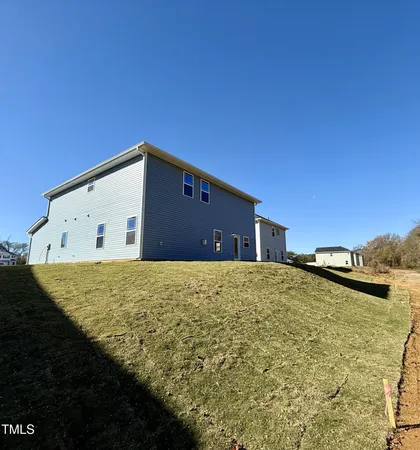 a house view with a outdoor space
