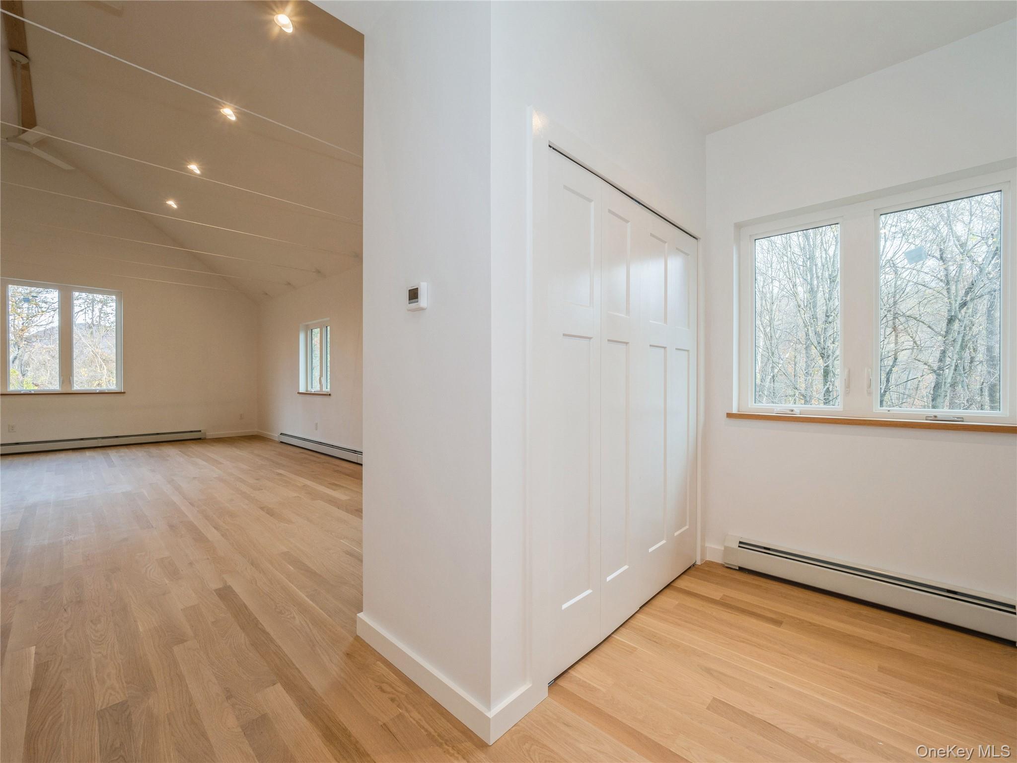 50 Old Albany Post Road North, Unit #1 Cold Spring, NY 10516 - Photo 5 of 18 a view of an empty room with wooden floor and a window