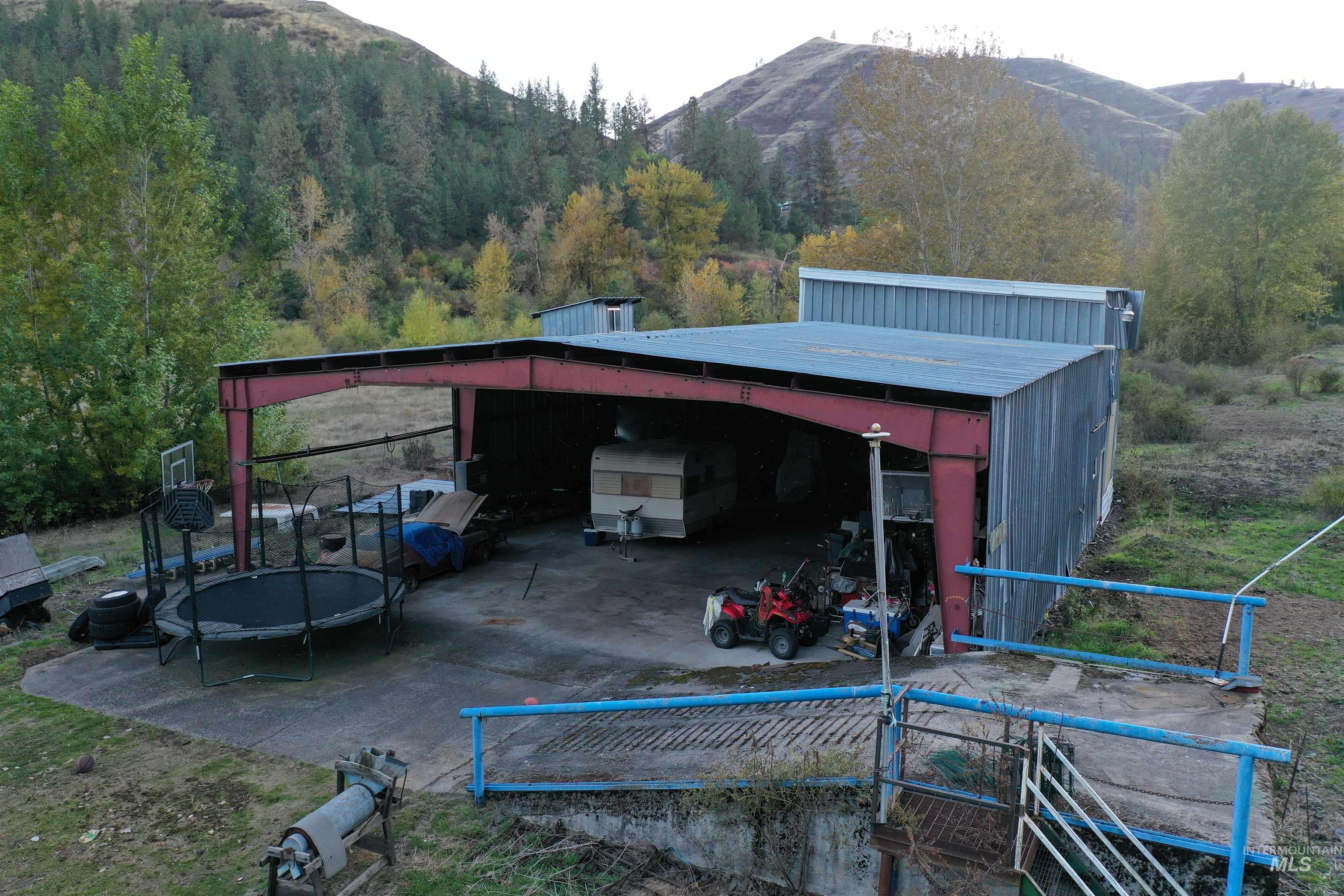3210 Highway 162 Kamiah, ID 83536 - Photo 4 of 28 View of outbuilding with a trampoline and a mountain view