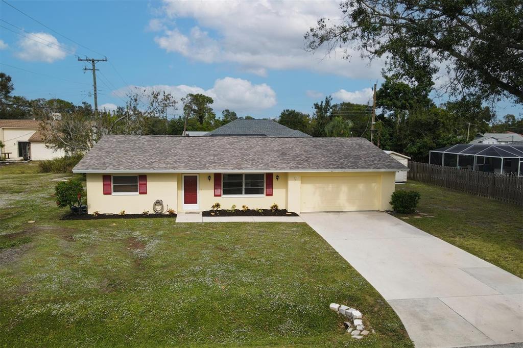 641 Beverly Road Venice, FL 34293 - Photo 1 of 1 a front view of a house with garden