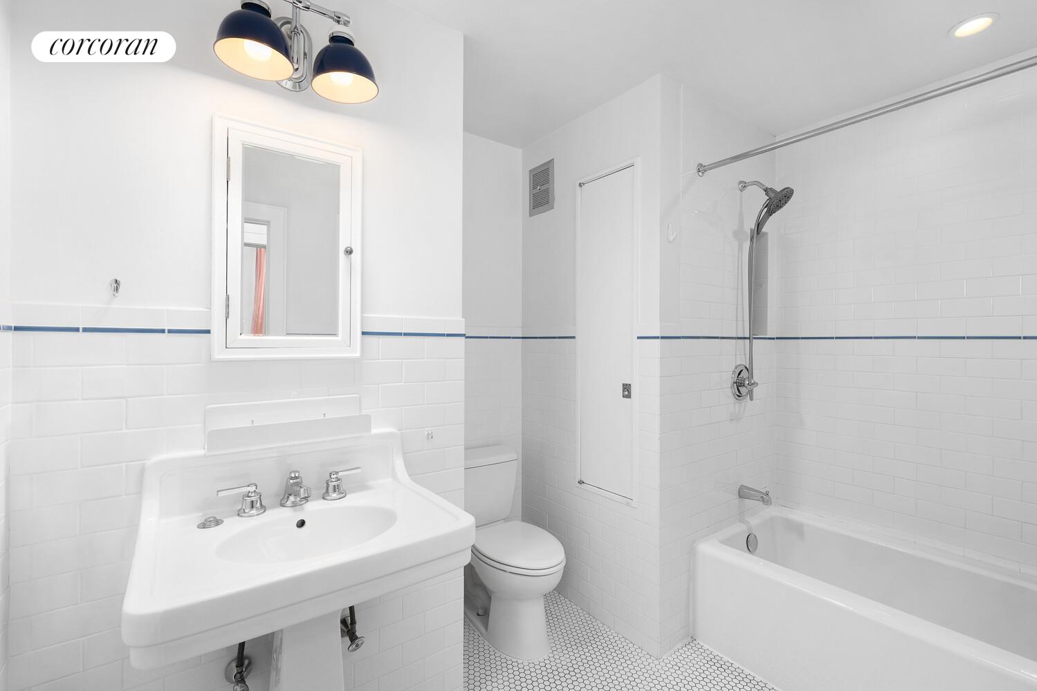 263 Clinton Street, Unit 2 Brooklyn, NY 11201 - Photo 4 of 6 a bathroom with a sink a toilet and shower