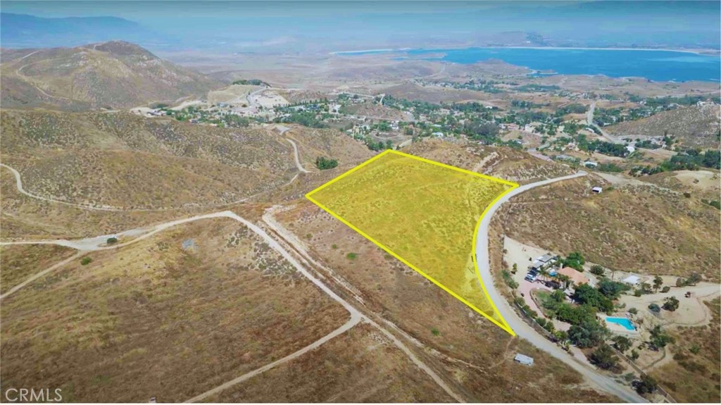 14557 Burwood Drive Perris, CA 92570 - Photo 7 of 12 a view of a swimming pool with a mountain view
