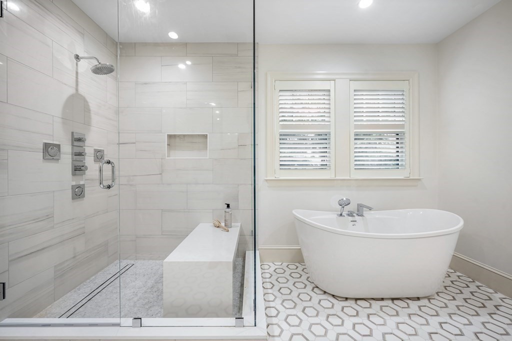 29 Pine Summit Circle, Unit 29 Weston, MA 02493 - Photo 20 of 30 a bathroom with a bathtub and shower