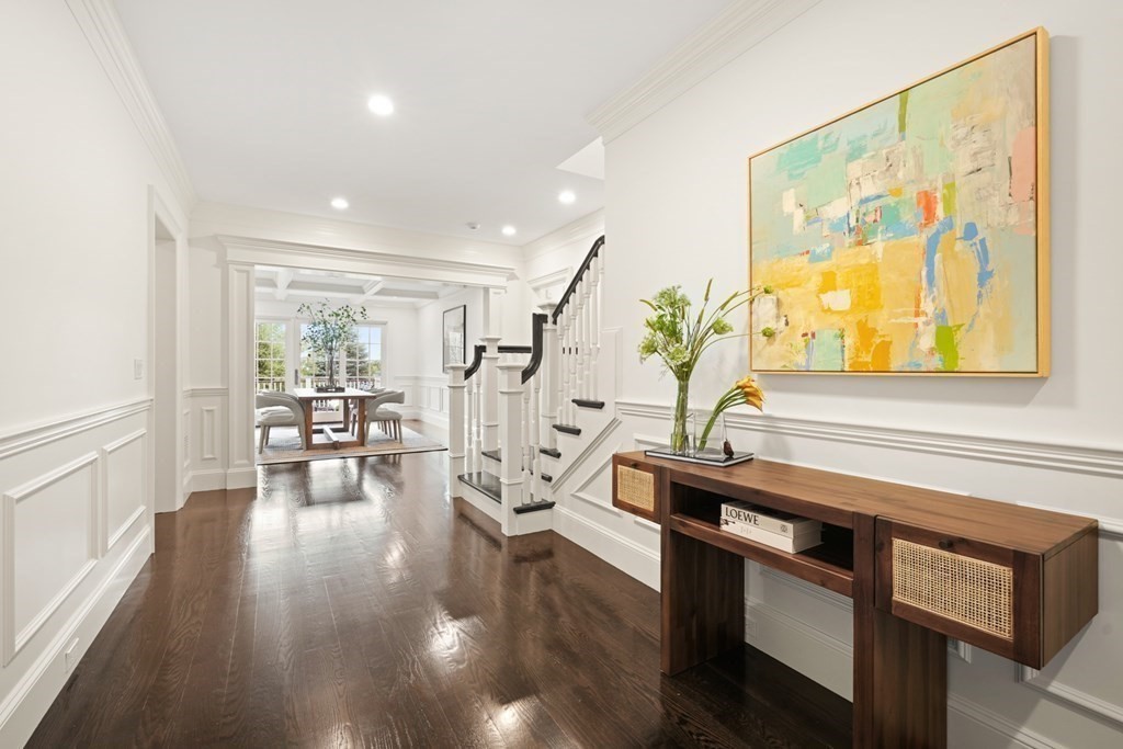 29 Pine Summit Circle, Unit 29 Weston, MA 02493 - Photo 21 of 30 a living room with furniture and wooden floor