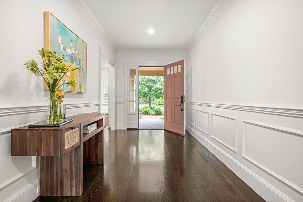 29 Pine Summit Circle, Unit 29 Weston, MA 02493 - Photo 3 of 30 a view of hallway with wooden floor