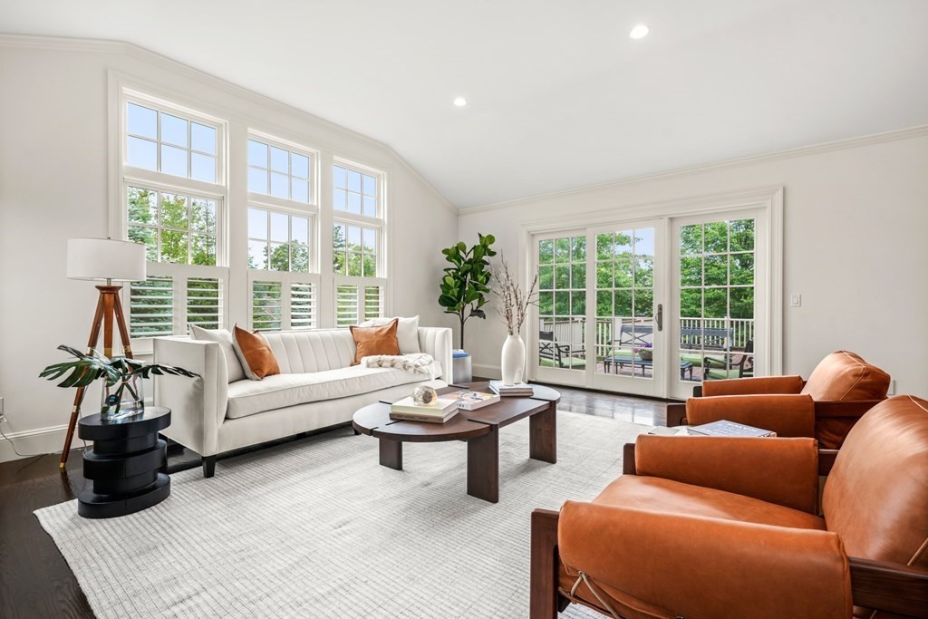 29 Pine Summit Circle, Unit 29 Weston, MA 02493 - Photo 6 of 30 a living room with furniture and a large window