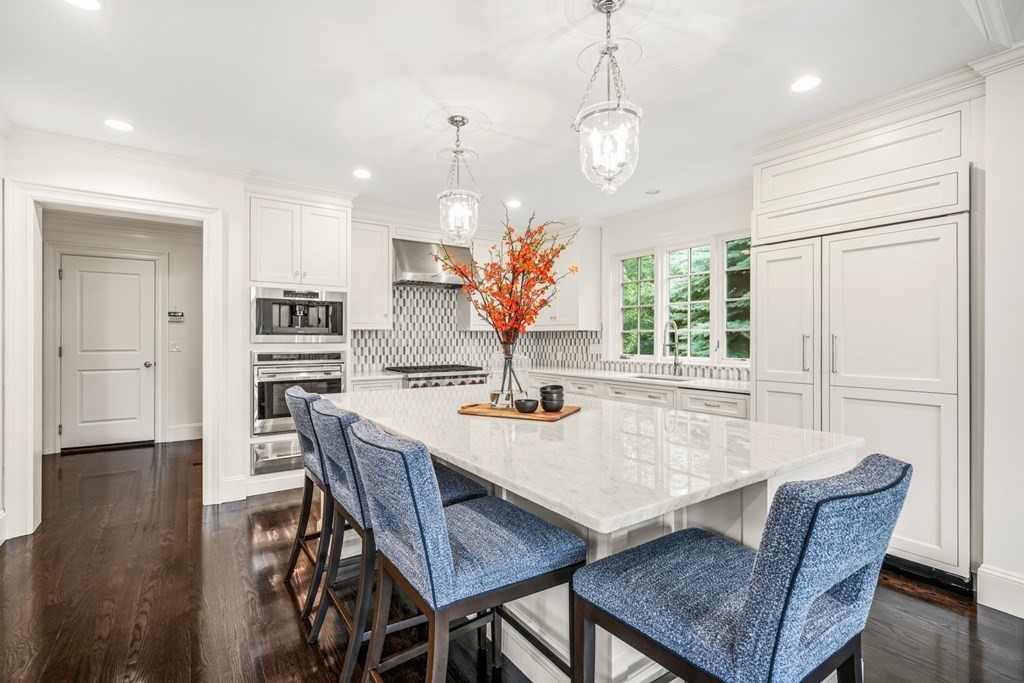 29 Pine Summit Circle, Unit 29 Weston, MA 02493 - Photo 9 of 30 a view of a dining room with furniture window and wooden floor