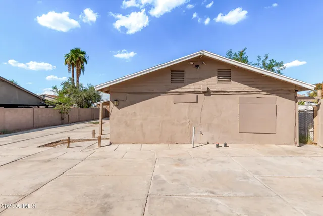 a view of an house with backyard space