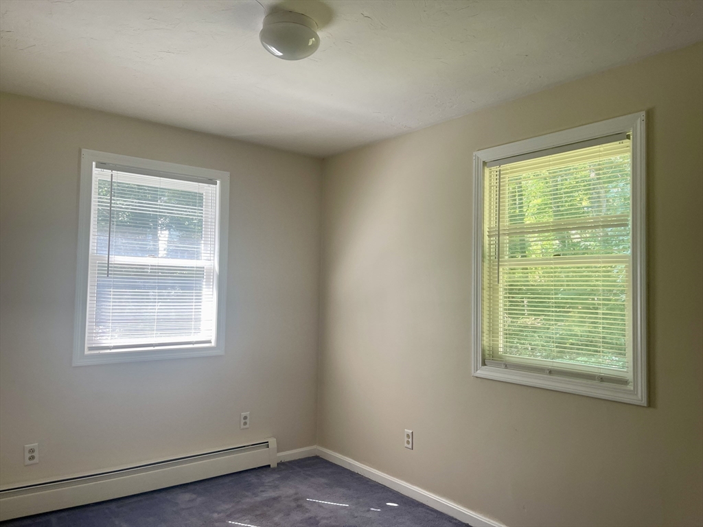 15 McBride Road Wales, MA 01081 - Photo 10 of 15 an empty room with a window