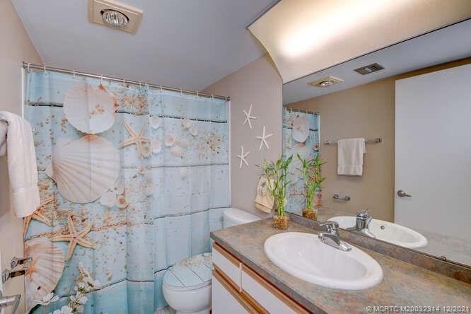 1950 Southwest Palm City Road, Unit 13303 Stuart, FL 34994 - Photo 21 of 34 Guest bathroom.