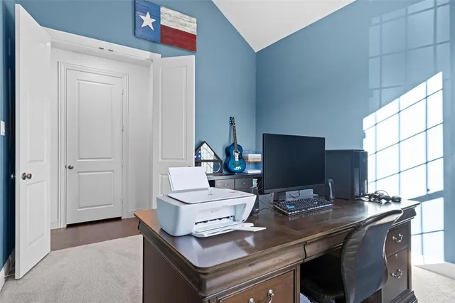 a view of a workspace with furniture