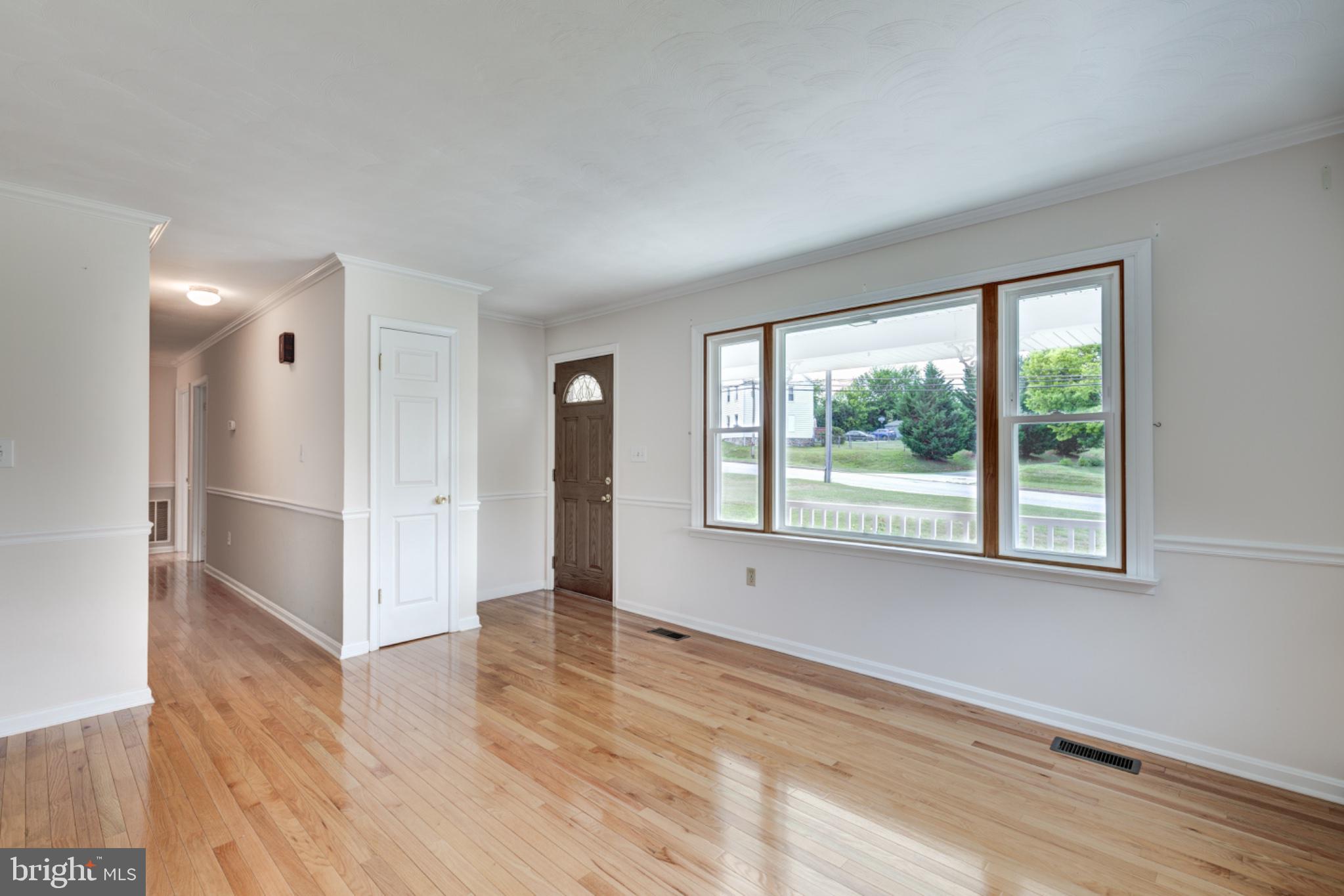 544 Uniontown Road Westminster, MD 21158 - Photo 4 of 51 Front door leads to living room with large window