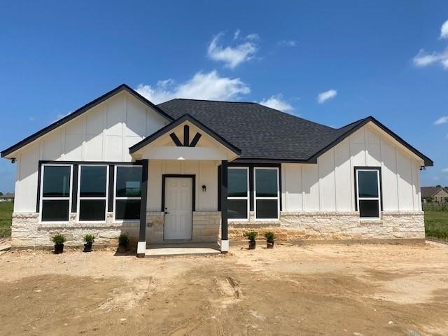 14711 Barak Road Guy, TX 77444 - Photo 2 of 8 a front view of a house with a garage