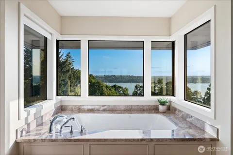 a view of a living room and a large window