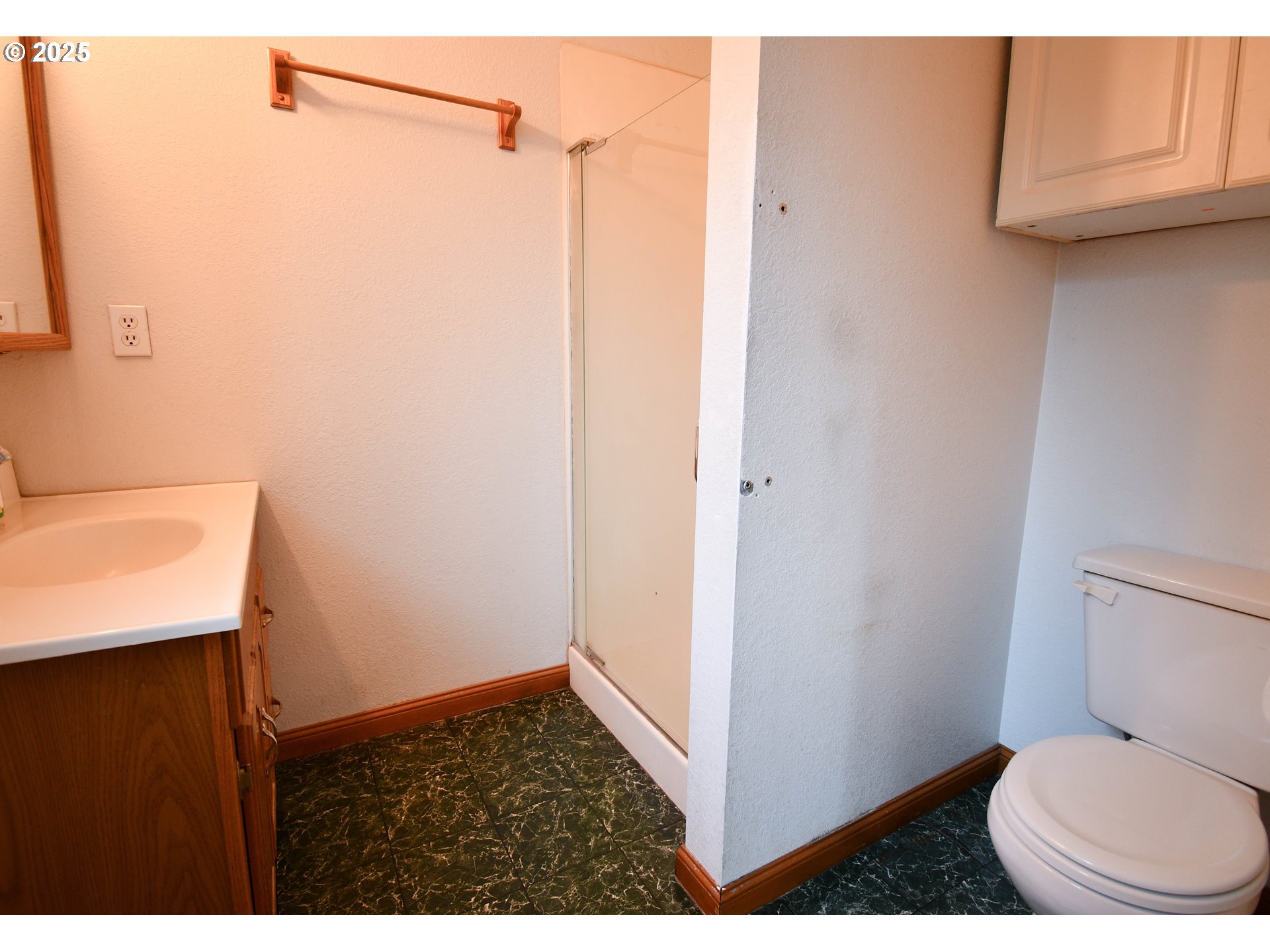 1731 Southeast Hamilton Street Roseburg, OR 97470 - Photo 12 of 23 a bathroom with a toilet and a sink