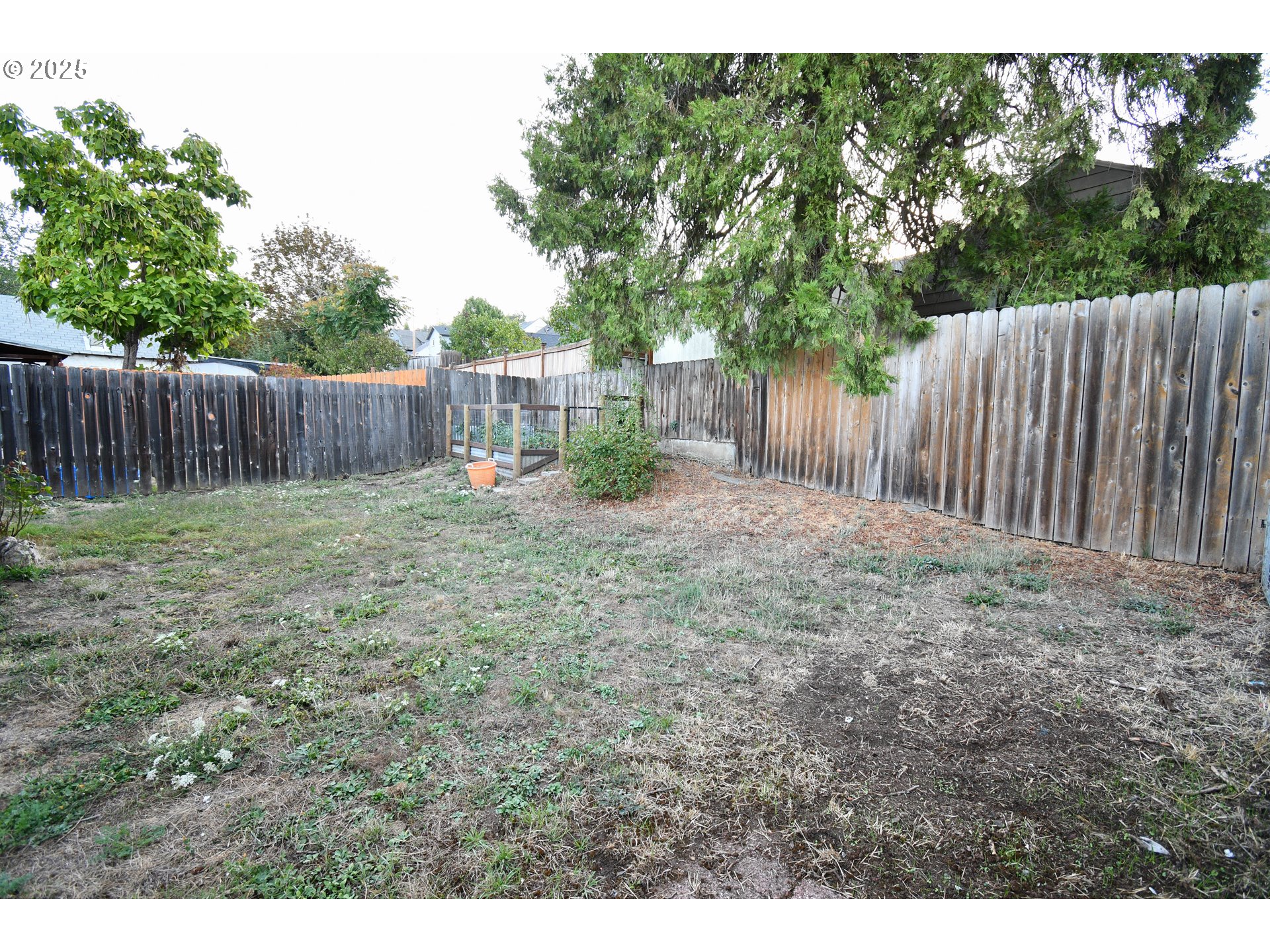 1731 Southeast Hamilton Street Roseburg, OR 97470 - Photo 21 of 23 a view of garden with wooden fence