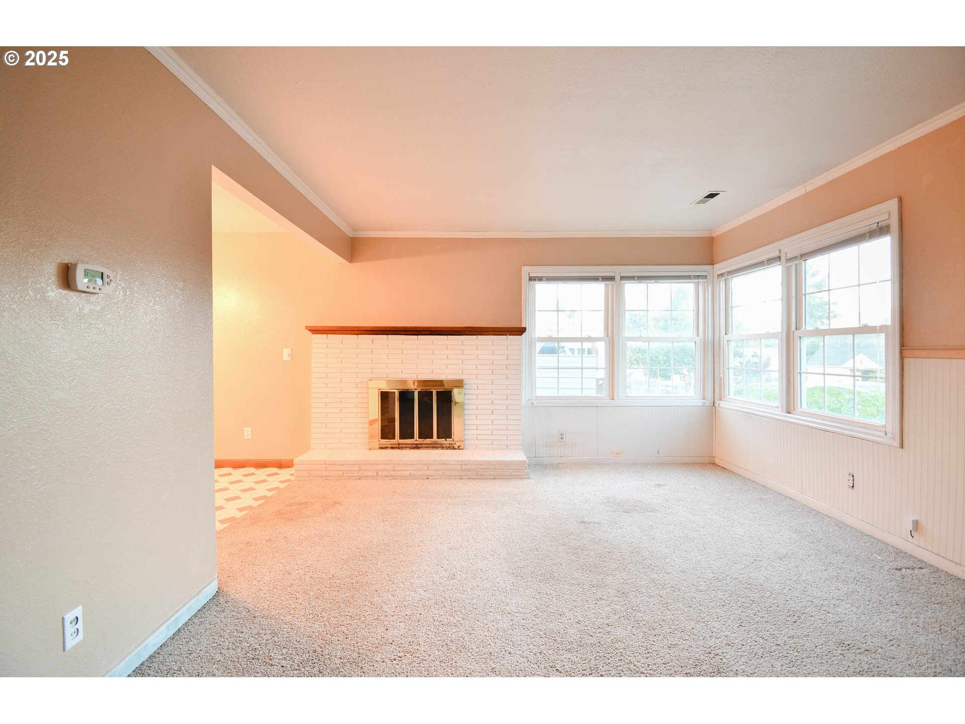 1731 Southeast Hamilton Street Roseburg, OR 97470 - Photo 4 of 23 a view of an empty room with a window