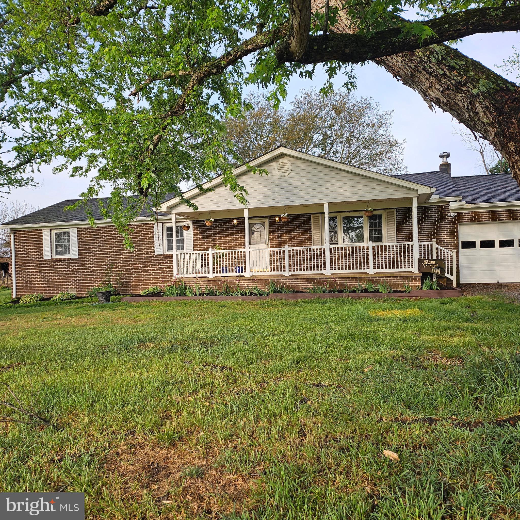 9348 Bastable Mill Road Catlett, VA 20119 - Photo 20 of 20 a view of a house with yard and sitting area