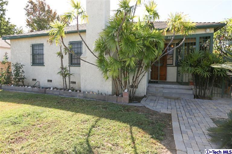 324 East Ramona Road Alhambra, CA 91801 - Photo 1 of 72 a front view of a house with garden