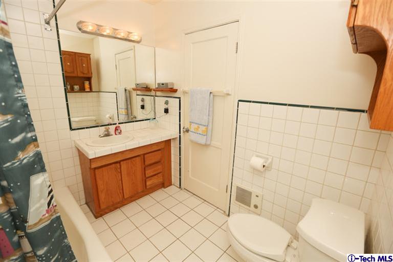 324 East Ramona Road Alhambra, CA 91801 - Photo 25 of 72 a bathroom with a sink a toilet and shower