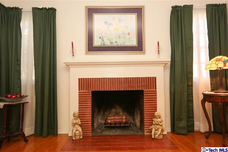 324 East Ramona Road Alhambra, CA 91801 - Photo 3 of 72 a living room with furniture and a fireplace