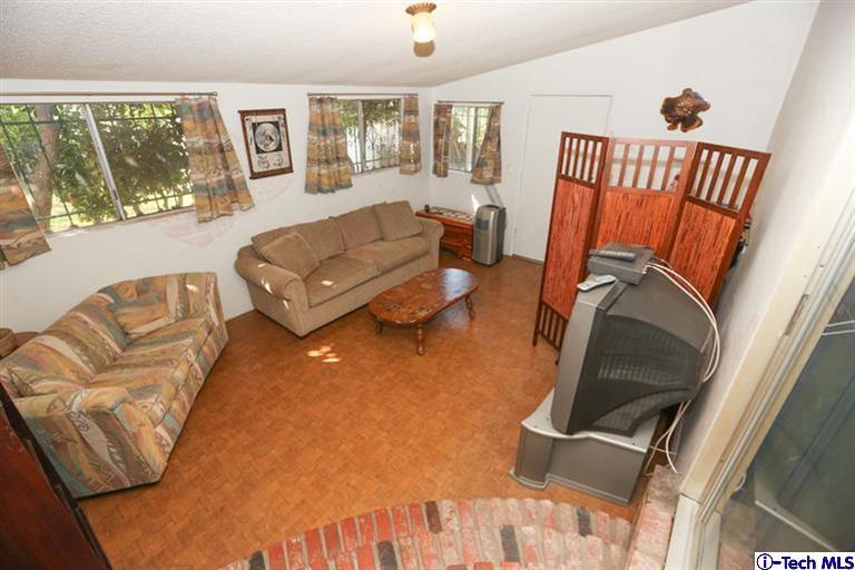 324 East Ramona Road Alhambra, CA 91801 - Photo 38 of 72 a living room with furniture and a window