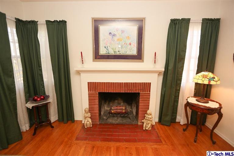324 East Ramona Road Alhambra, CA 91801 - Photo 4 of 72 a living room with furniture and a fireplace