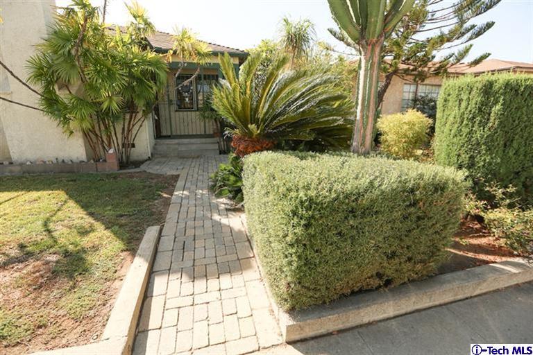 324 East Ramona Road Alhambra, CA 91801 - Photo 54 of 72 a view of a yard with plants and trees