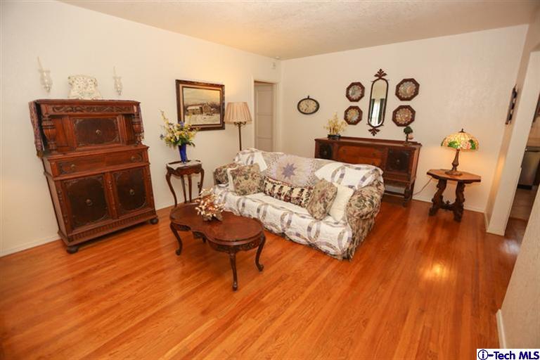 324 East Ramona Road Alhambra, CA 91801 - Photo 6 of 72 a living room with furniture and a wooden floor
