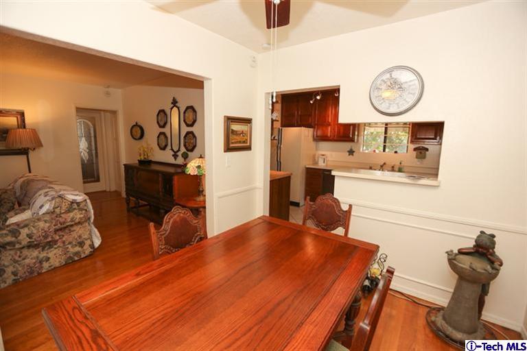 324 East Ramona Road Alhambra, CA 91801 - Photo 8 of 72 a bedroom with furniture and a clock