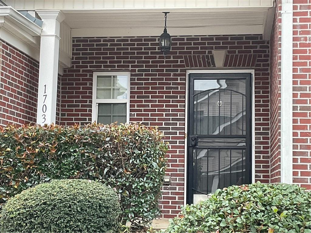 2555 Flat Shoals Road, Unit 1703 Atlanta, GA 30349 - Photo 2 of 26 a view of front door of house