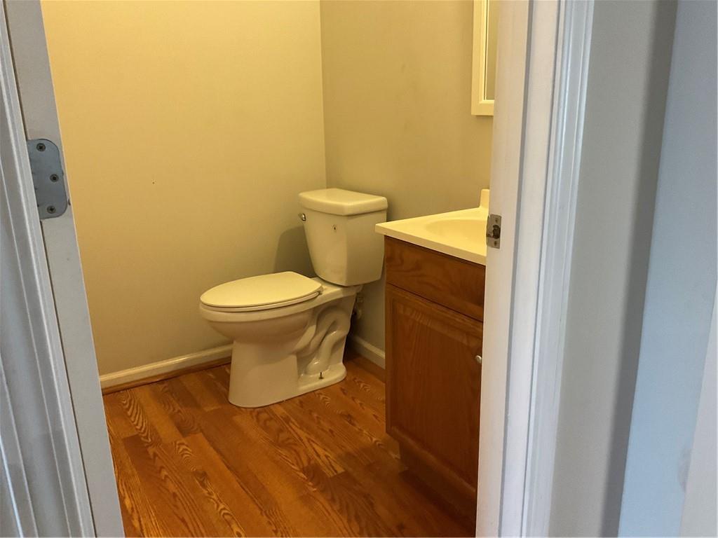 2555 Flat Shoals Road, Unit 1703 Atlanta, GA 30349 - Photo 7 of 26 a bathroom with a toilet and a sink