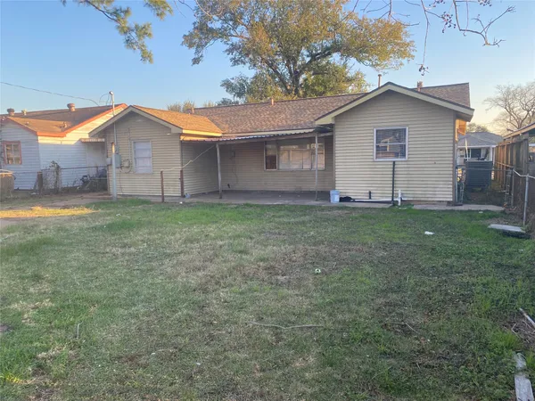 a view of a swimming pool with an outdoor space and seating area