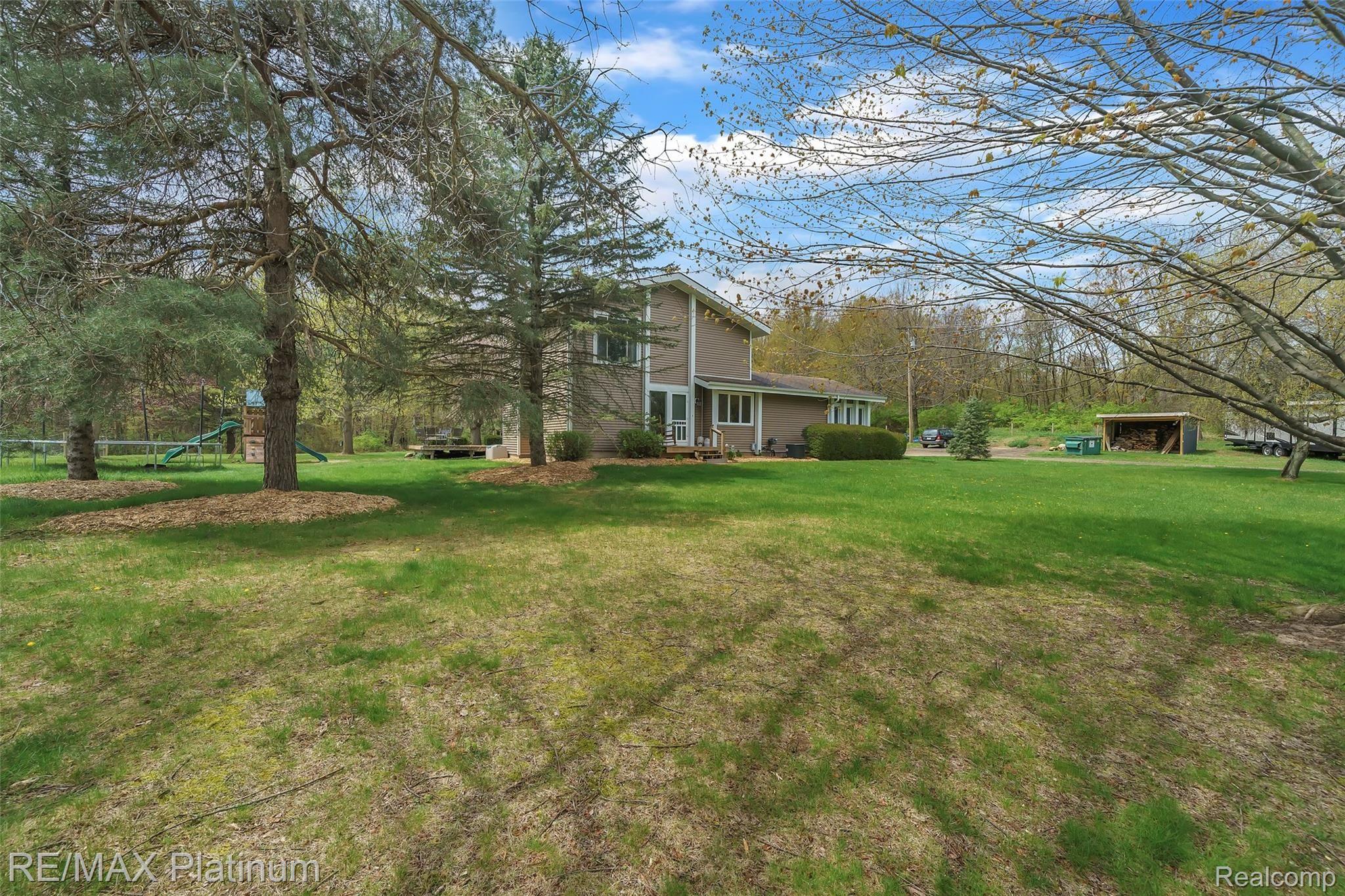 4195 North Nicholson Road Fowlerville, MI 48836 - Photo 3 of 48 03_4195NICHOLSONRDWindowStillRealEstatePhotography3_mls.jpg