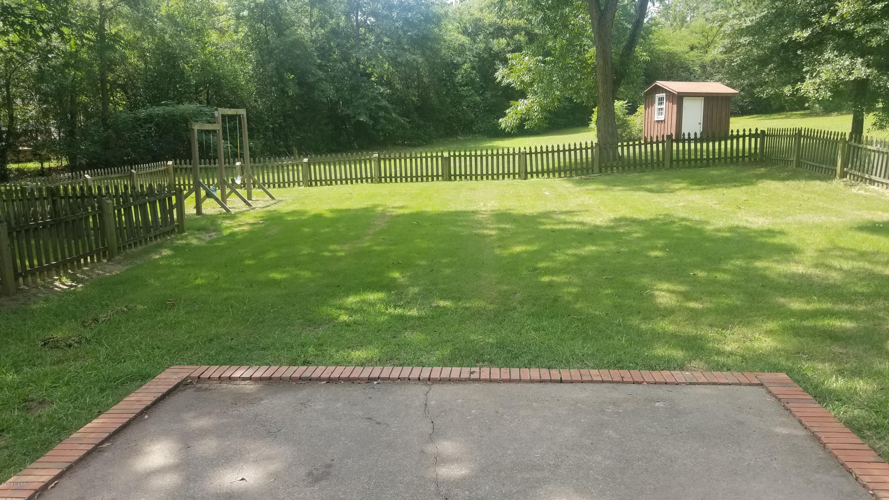 2718 Allen Road Macon, GA 31216 - Photo 12 of 12 a view of a park with a fence