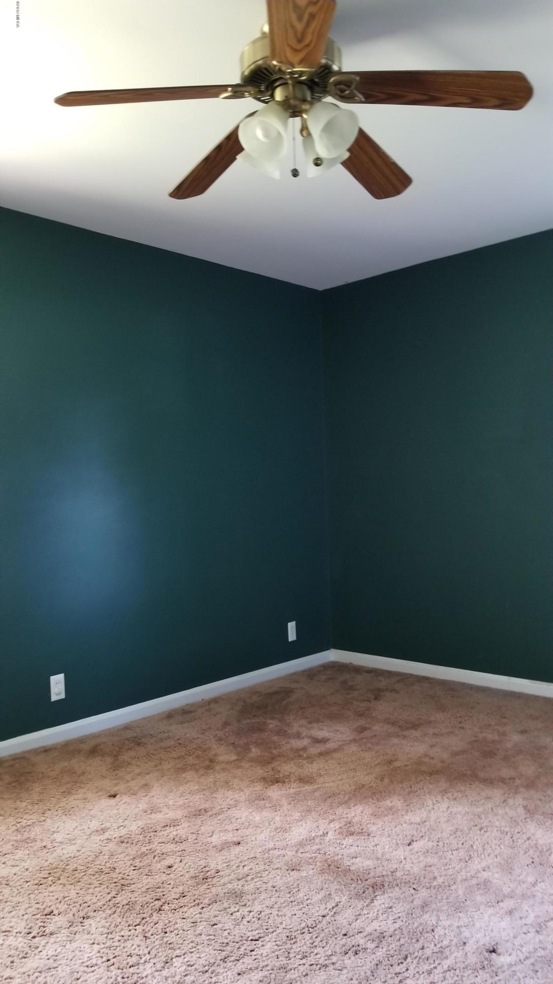 2718 Allen Road Macon, GA 31216 - Photo 6 of 12 a view of a room with a fan