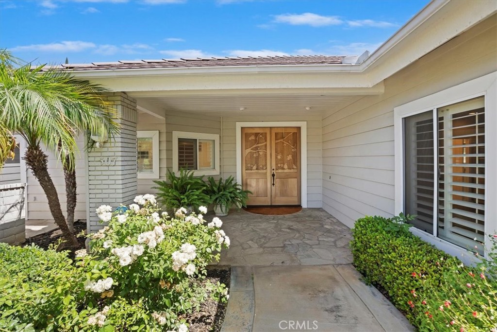 1507 Weston Way Riverside, CA 92506 - Photo 7 of 55 a view of a house with a flower garden