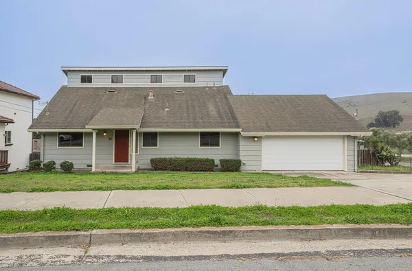 a front view of house with yard
