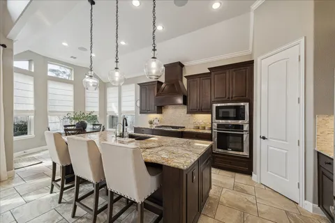 a kitchen with granite countertop lots of counter top space