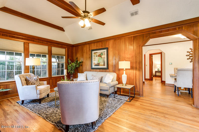 3827 Gadsden Road Jacksonville, FL 32207 - Photo 3 of 25 a living room with furniture and a large window