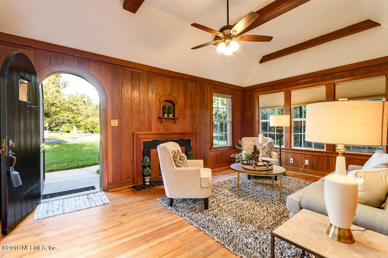 3827 Gadsden Road Jacksonville, FL 32207 - Photo 5 of 25 a living room with furniture and a large window