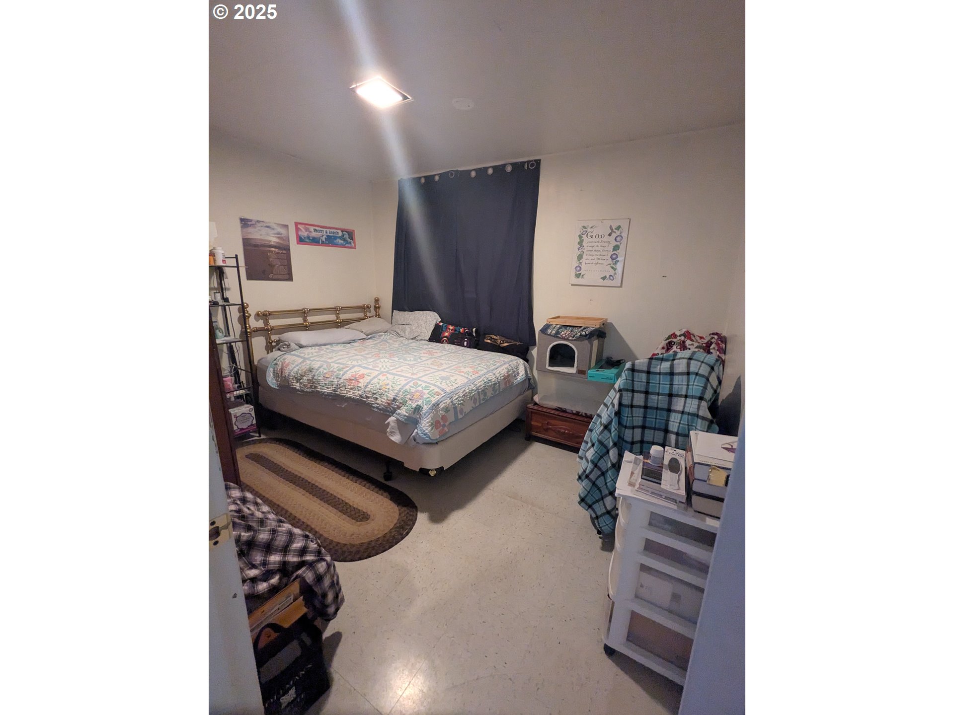 28475 Andy Riggs Road Grand Ronde, OR 97347 - Photo 7 of 15 a bedroom with bed and a window