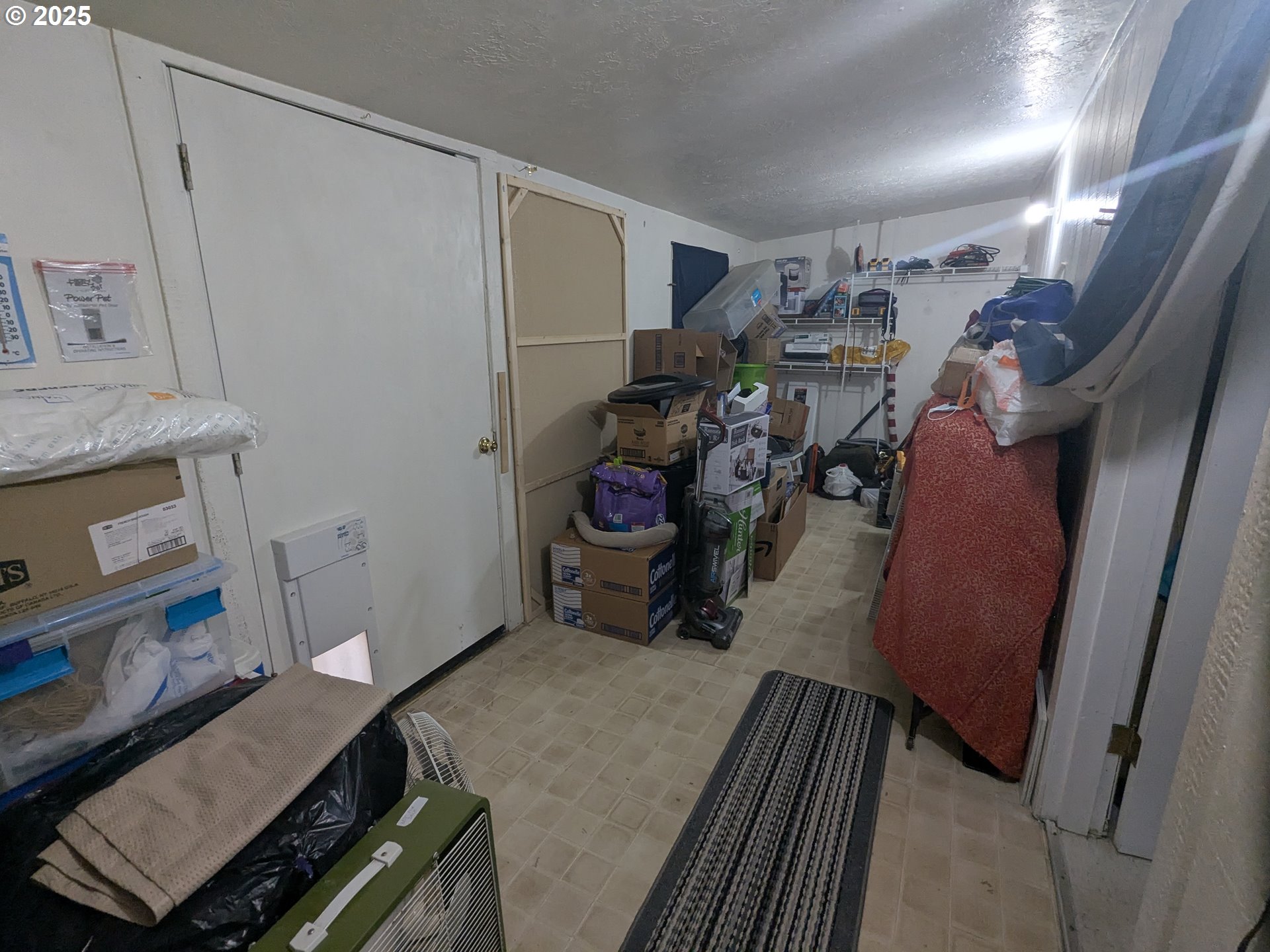 28475 Andy Riggs Road Grand Ronde, OR 97347 - Photo 10 of 15 a room with furniture and white walls